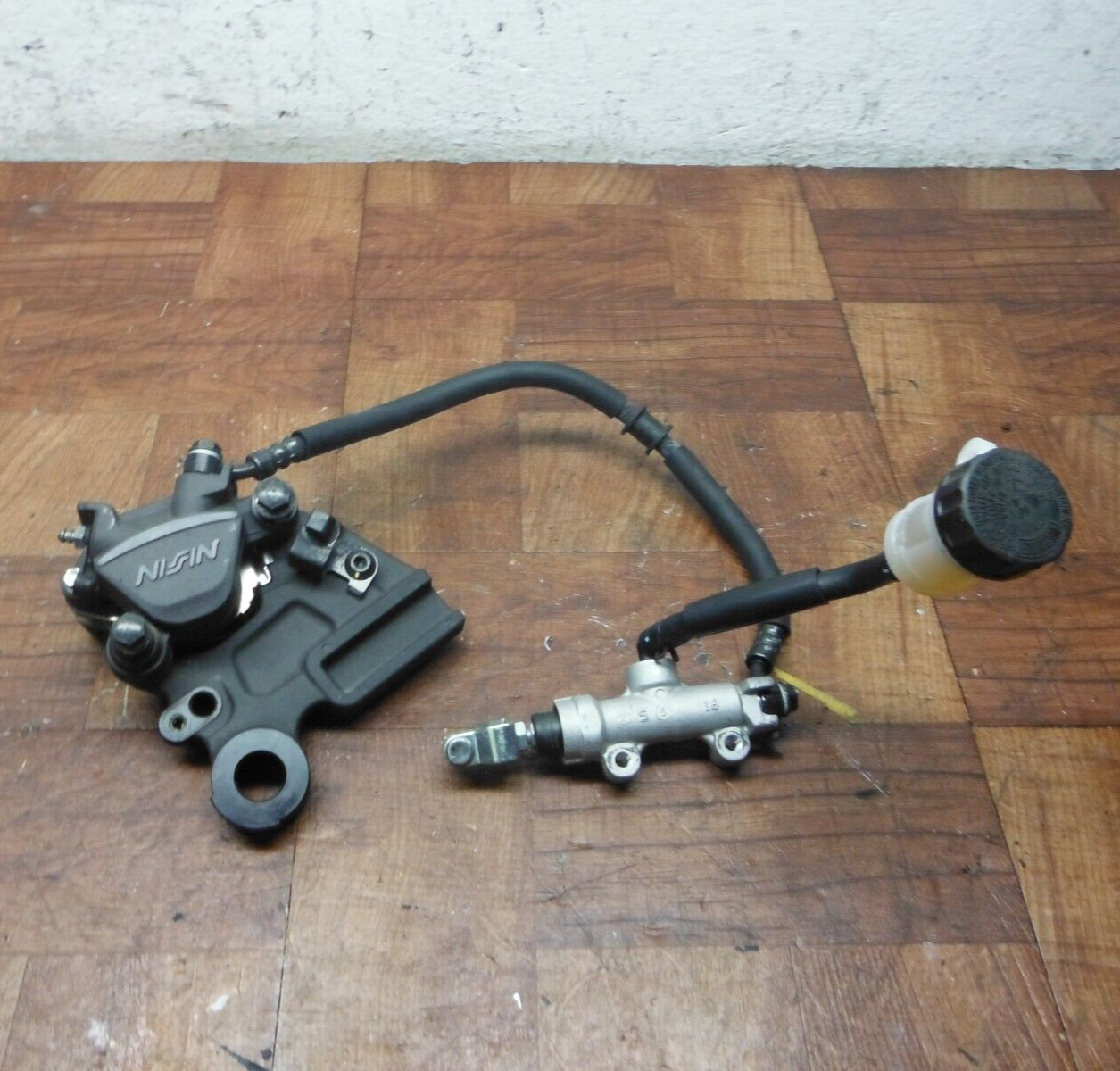 2023 kawasaki EX650 NINJA REAR BACK BRAKE CALIPER W MOUNT BRACKET