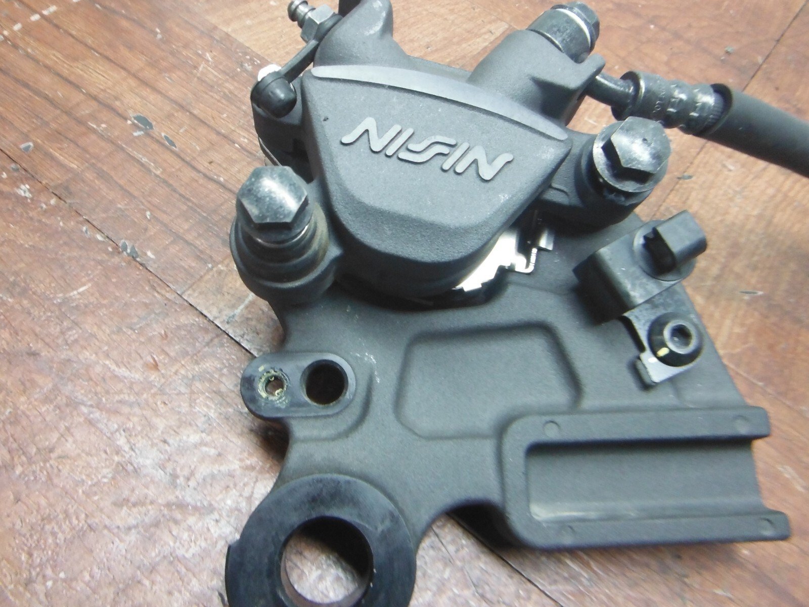 2023 kawasaki EX650 NINJA REAR BACK BRAKE CALIPER W MOUNT BRACKET - Image 2